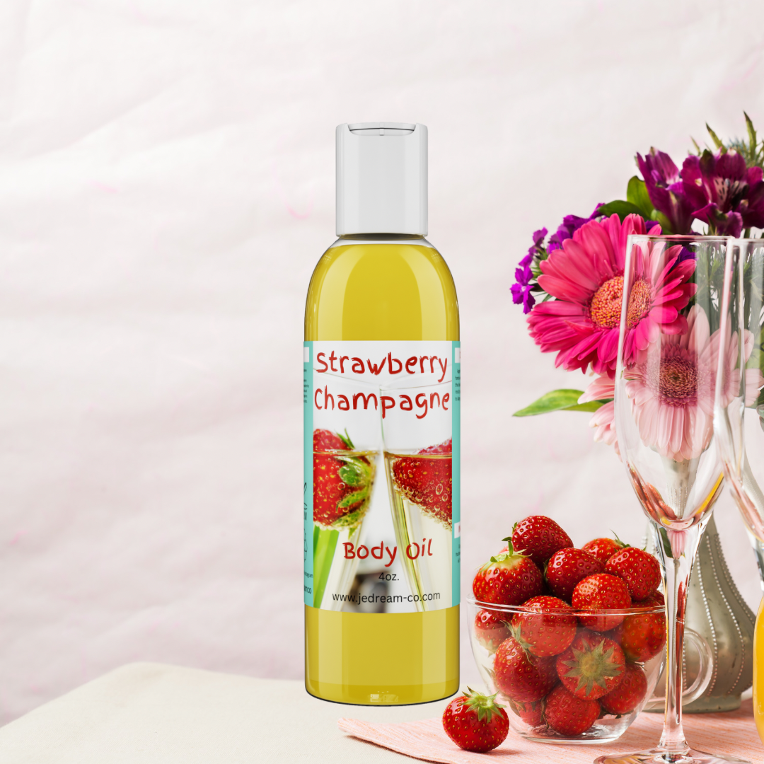Strawberry champagne body oil with strawberries and champagne glasses in background 